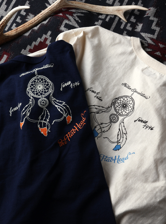 .01 ウェブショップ限定のプリントヘンリーネック