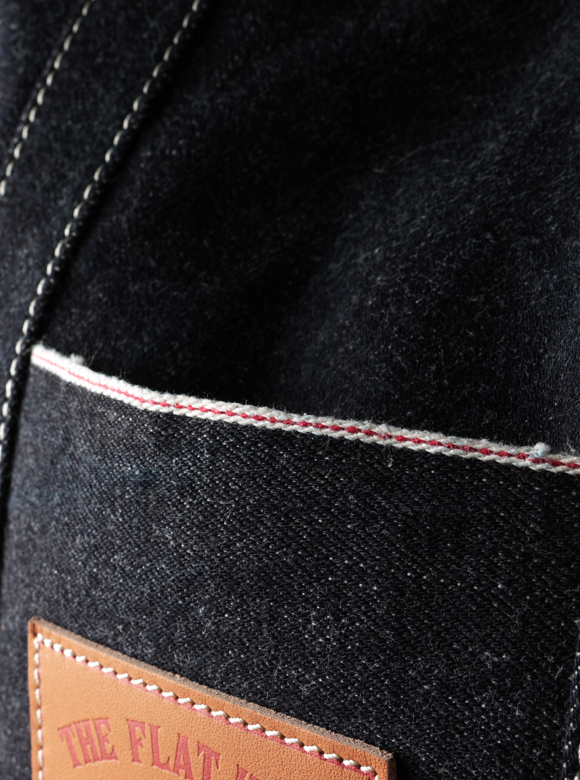 .05 旧式シャトル織機で織り上げられた証